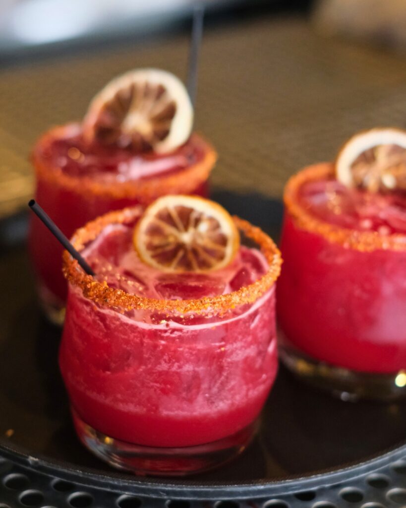 Bright pink beet cocktail served at the marina restaurant in brattleboro